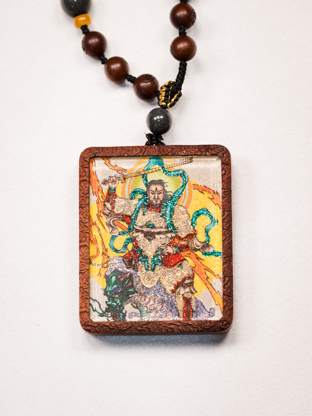 手绘点彩 武相雷祖 枣木外壳 吊坠唐卡
