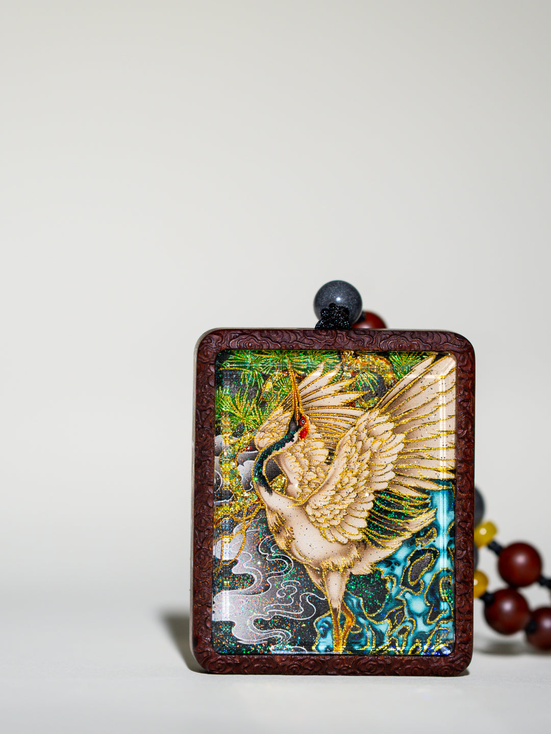 手绘点彩元始侍童白鹤童子枣木外壳吊坠唐卡