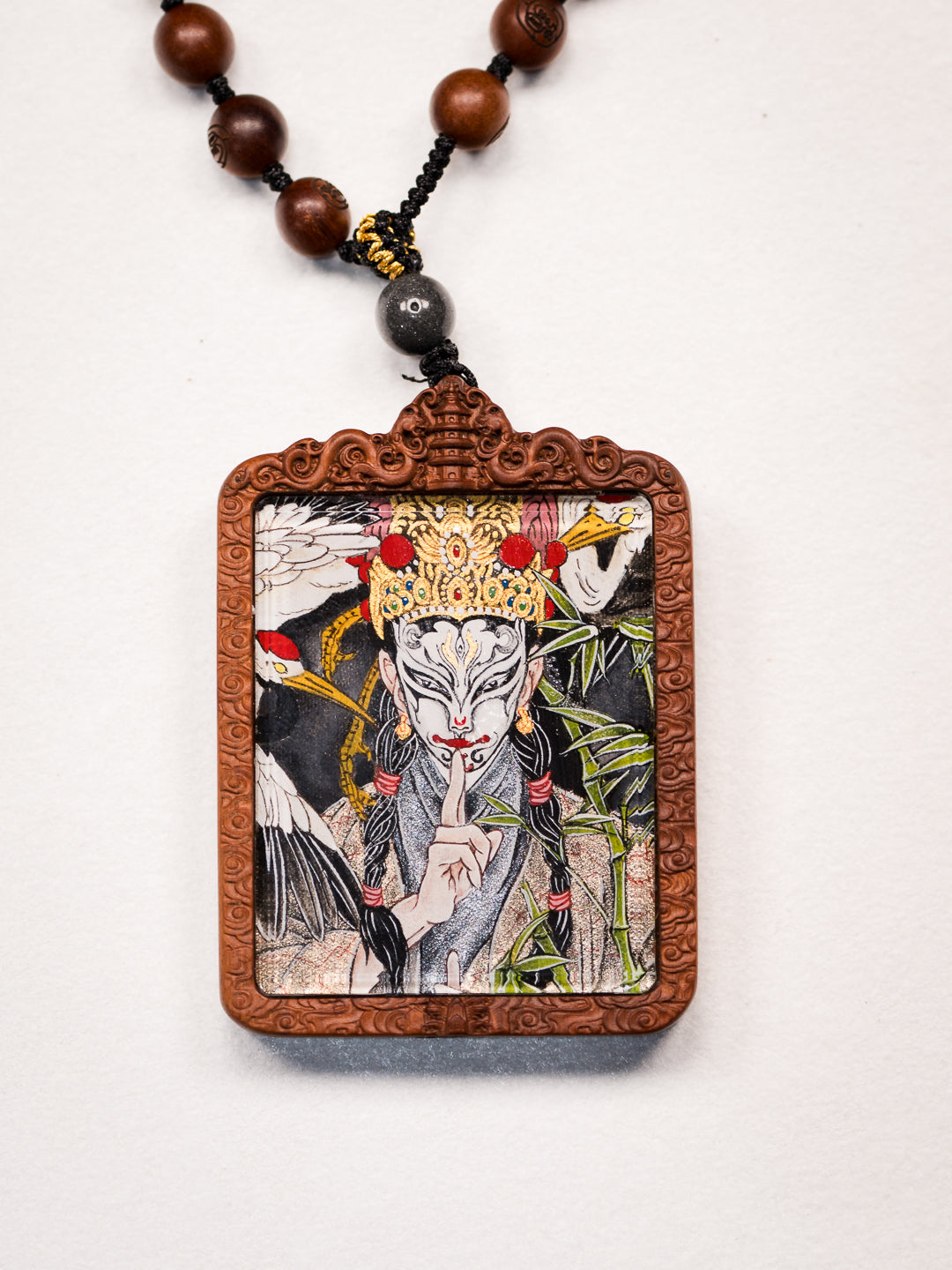 纯手绘 官将首白鹤童子枣木外壳吊坠唐卡