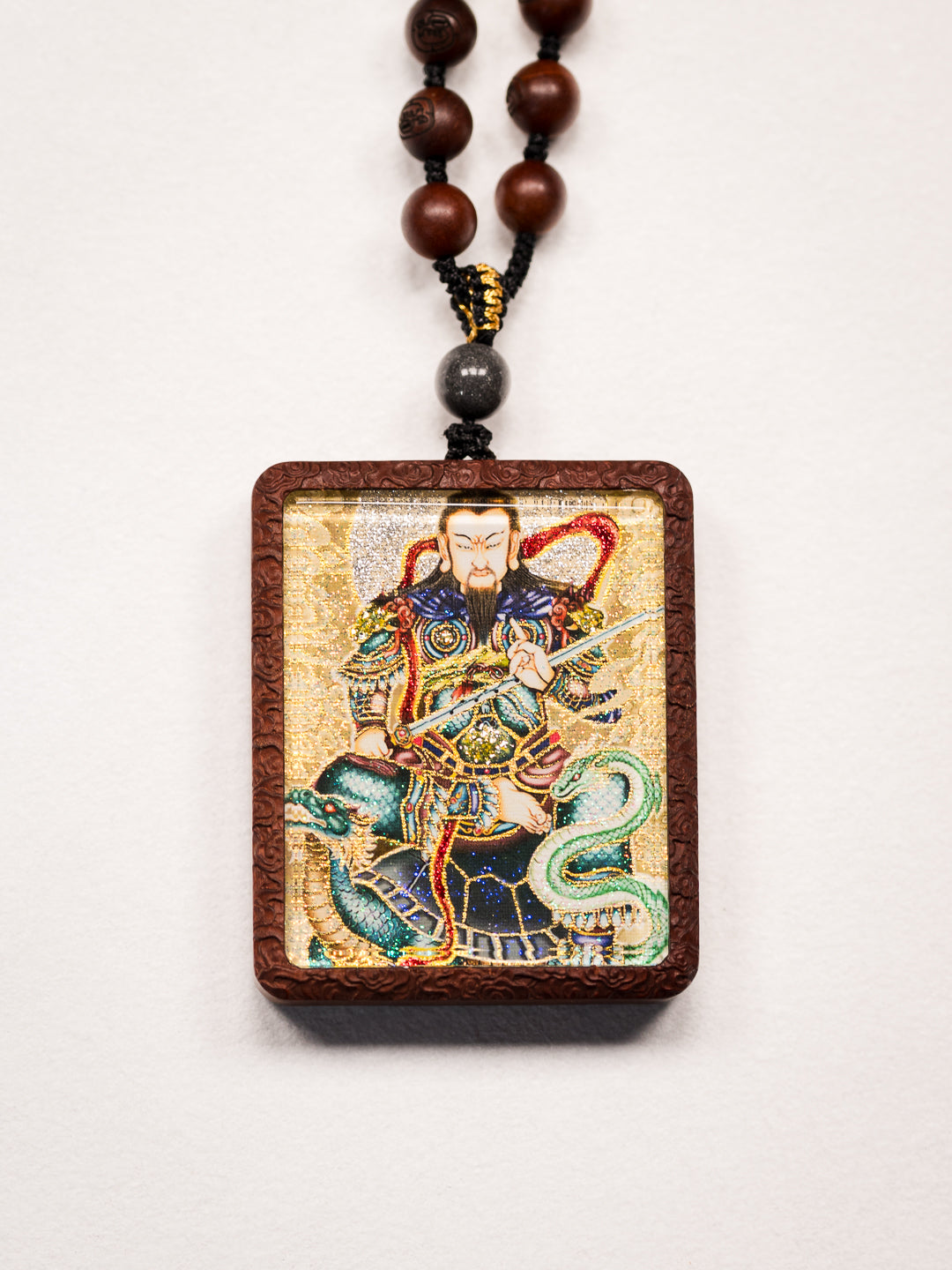 手绘点彩 真武大帝枣木外壳吊坠唐卡