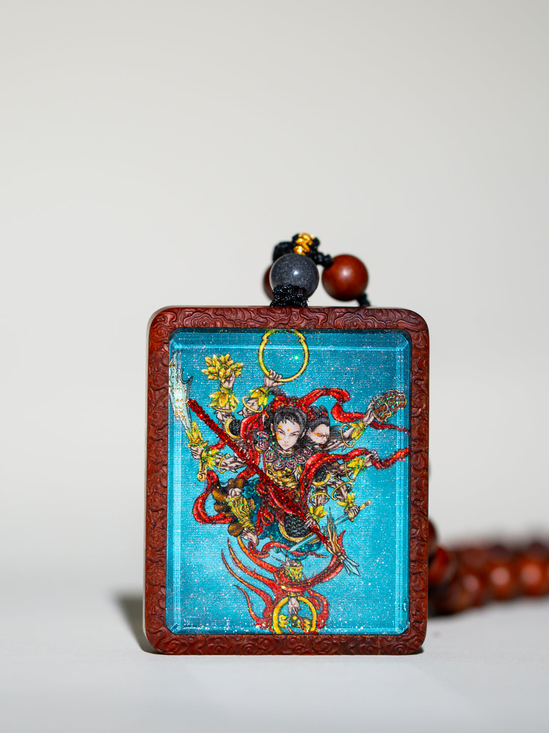 手绘点彩 哪吒 枣木外壳 小吊坠唐卡