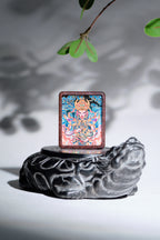 手绘点彩 官将首白鹤童子枣木外壳吊坠唐卡