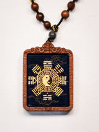 纯手绘 官将首白鹤童子枣木外壳吊坠唐卡