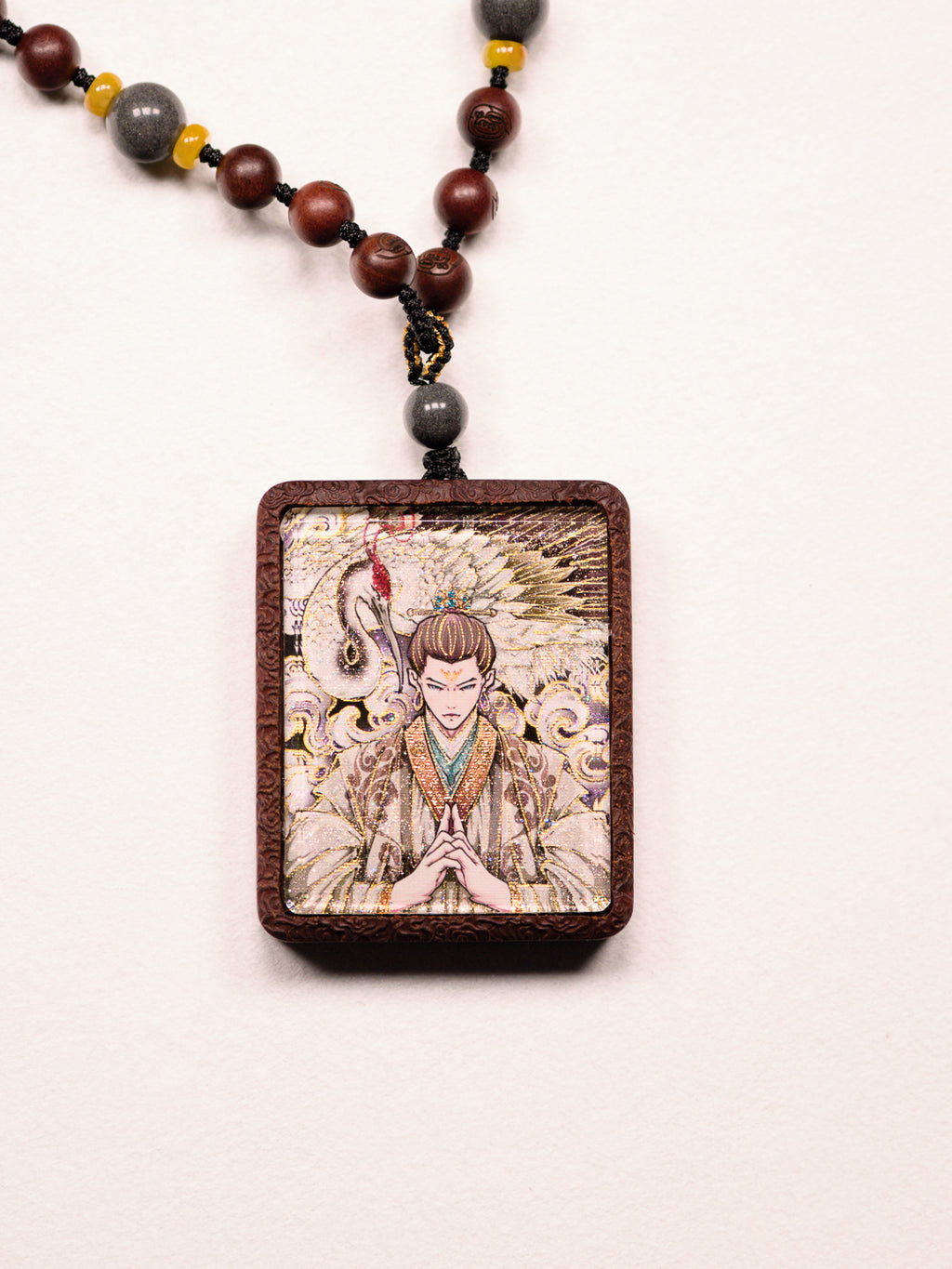 手绘点彩元始侍童白鹤童子枣木外壳吊坠唐卡