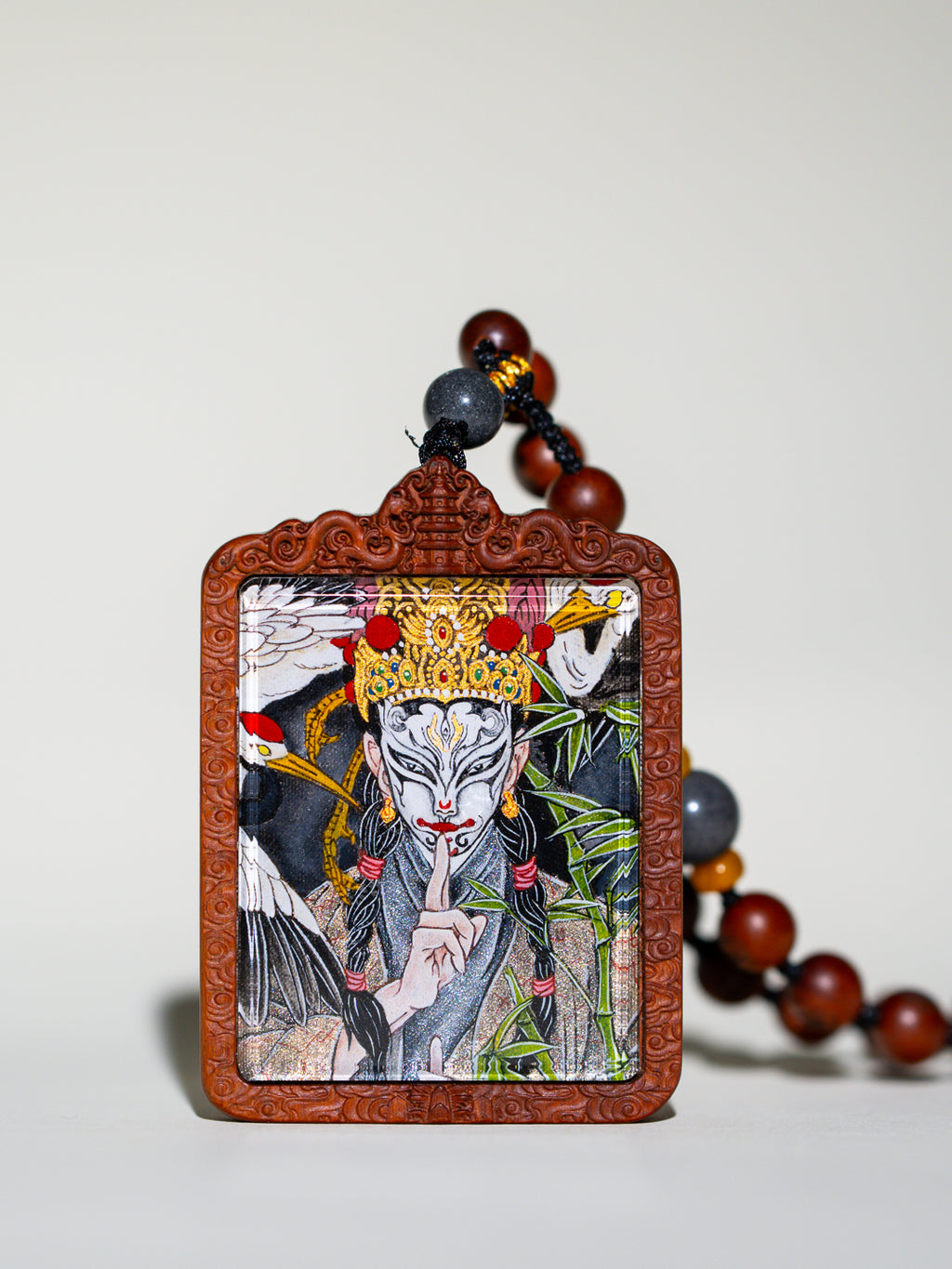 纯手绘 官将首白鹤童子枣木外壳吊坠唐卡